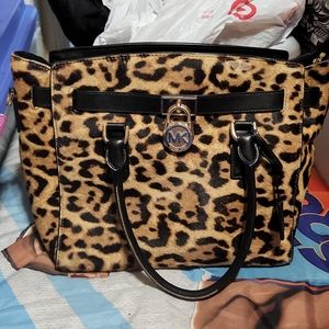Mk leaporad purse new never use